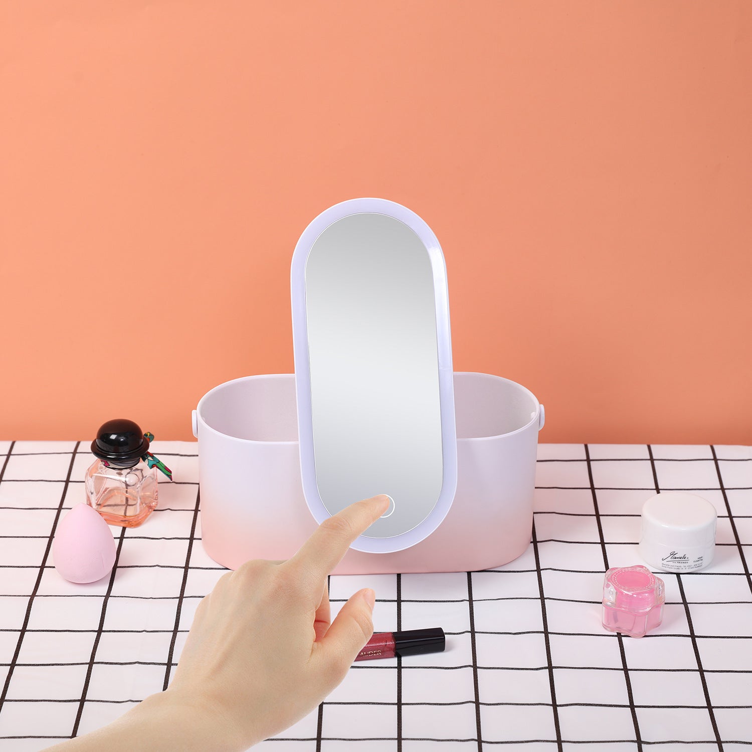 Boîte de rangement avec miroir de maquillage LED portable, idéale pour les voyages.