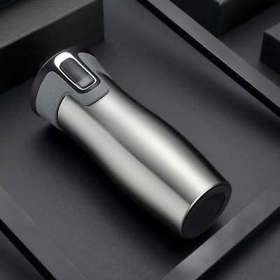 Gourde isotherme en acier inoxydable pour voyage, bouteille de thé ou mug isotherme.
