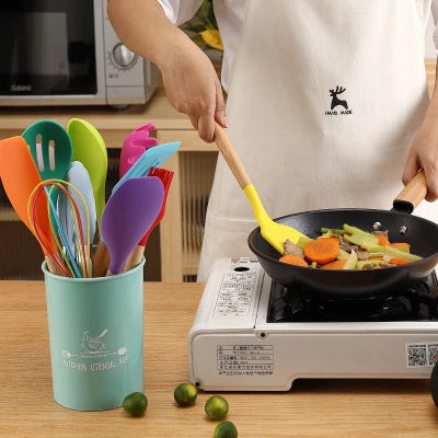 Ensemble d'ustensiles de cuisine en silicone résistants à la chaleur et antiadhésifs, pour la cuisson.