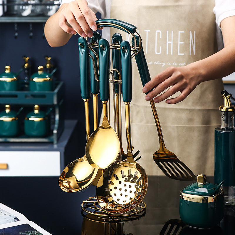 Ensemble de 7 ustensiles de cuisine en acier inoxydable et silicone : spatule ajourée, louche, cuillère de service, cuillère à pâtes.