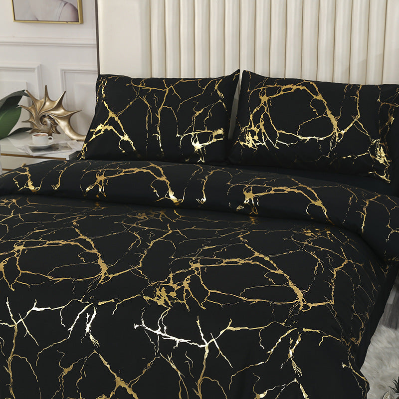 Housse de couette dorée en trois pièces pour usage domestique