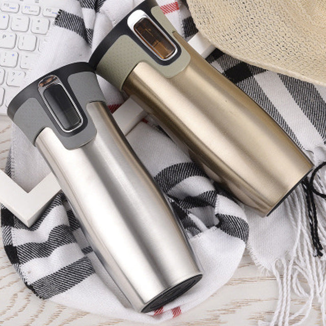 Gourde isotherme en acier inoxydable pour voyage, bouteille de thé ou mug isotherme.