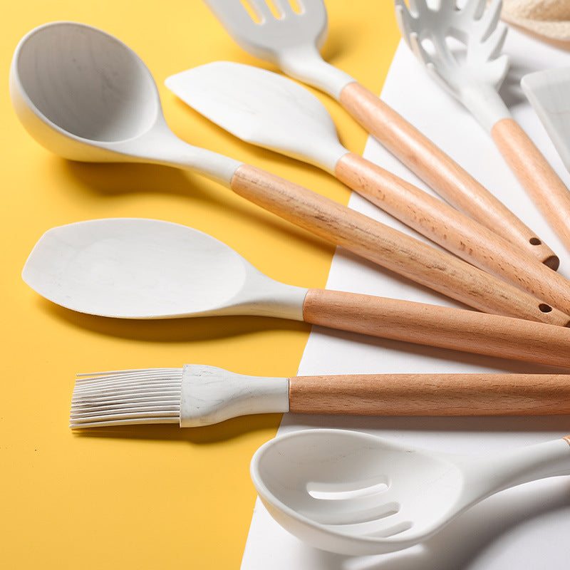 Ensemble d'ustensiles de cuisine en silicone avec poignées en bois blanc marbré