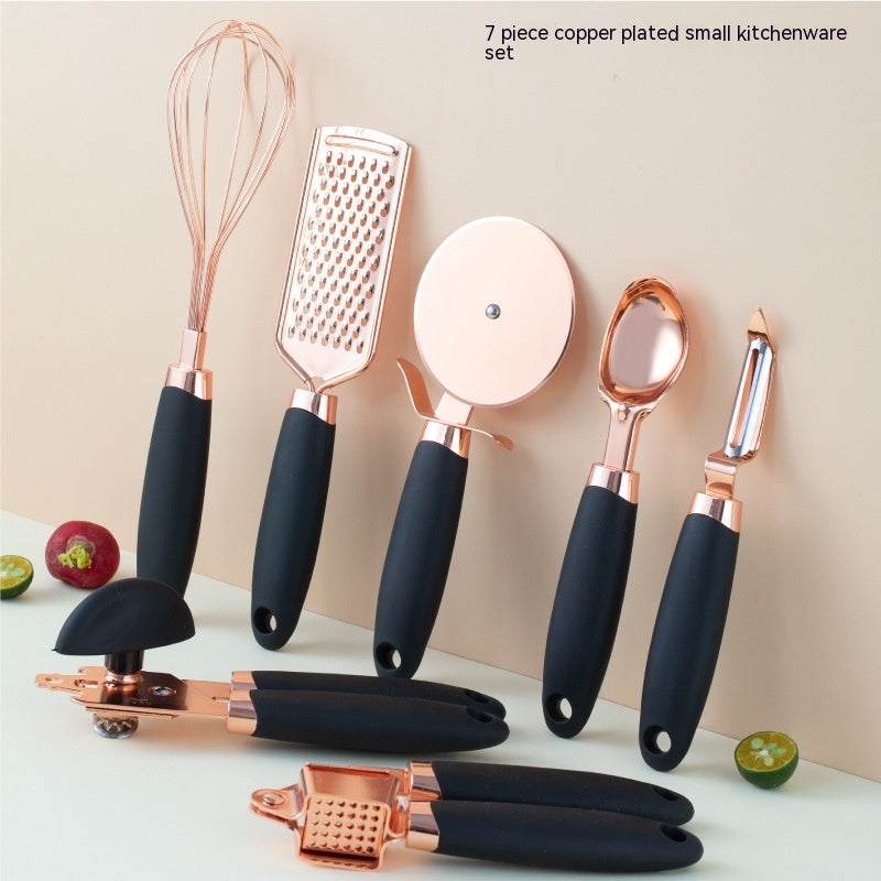 Ensemble d'éplucheurs de cuisine plaqués cuivre