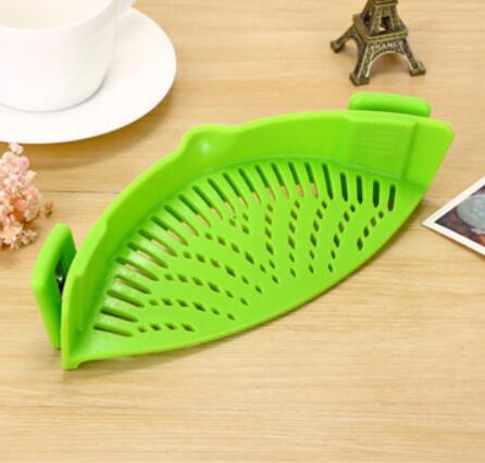Passoire à huile en silicone à clipser pour casseroles, poêles et bols. Passoire créative pour égoutter le riz et les liquides. Convient à toutes les tailles de casseroles.
